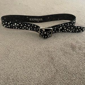 Black studded belt.